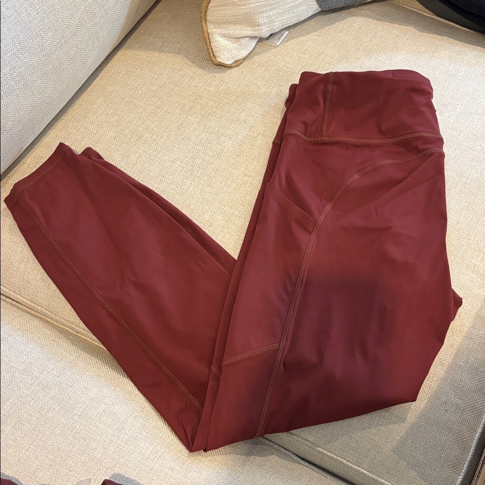 Vuori stride brick Leggings with side pockets size medium